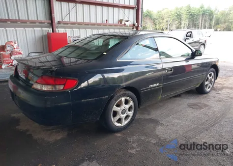 1999 Toyota Camry Solara Sle z USA, uszkodzony, nr VIN 2T1CF28P9XC212369